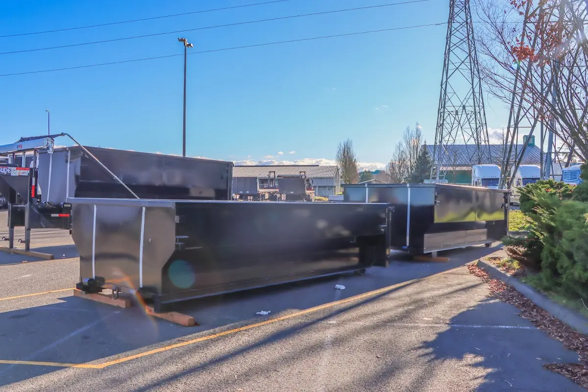 Roll-off dumpster ready for waste disposal at job site for 3 Yard Dumpster Rental in Dunn